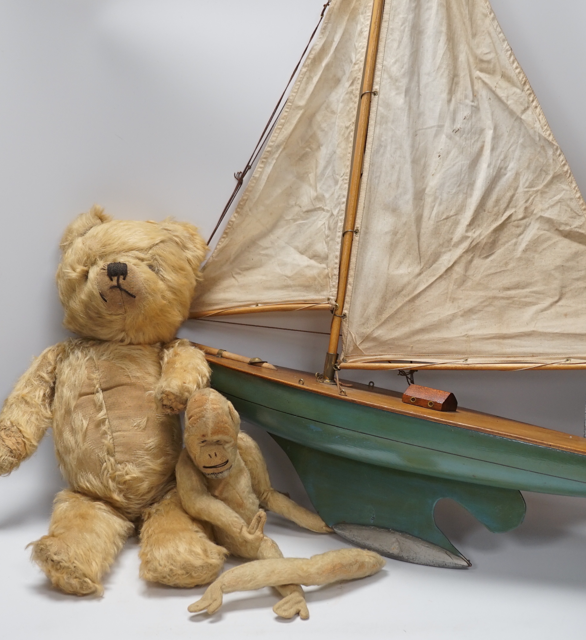 A pond yacht, an English mohair teddy bear and monkey, pond yacht 65cm wide